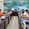 Lãnh đạo EVN chủ trì cuộc họp giao ban quý 3/2023 về tiến độ thi công xây dựng Nhà máy Thủy điện Hòa Bình mở rộng. (Ảnh: Đức Duy/ietnam+)