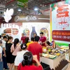 Các thương hiệu của Việt Nam tham gia triển lãm Kết nối chuỗi cung ứng hàng hóa quốc tế. (Ảnh: PV/Vietnam+)