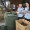 Lực lượng Quản lý thị trường thành phố Đà Nẵng kiểm tra điểm kinh doanh giày dép tại quận Cẩm Lệ. (Ảnh: PV/Vietnam+)