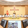 Bộ trưởng Nguyễn Hồng Diên chủ trì Hội nghị trực tuyến triển khai các nội dung liên quan đến Nghị định về mua bán điện trực tiếp. (Ảnh: Đức Duy/Vietnam+)