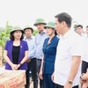 Phó Bí thư Thường trực Thành ủy Hà Nội Nguyễn Thị Tuyến và đoàn công tác kiểm tra công tác phòng, chống lụt bão tại xã An Phú, huyện Mỹ Đức. (Ảnh: Hanoi)