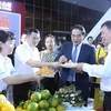 Các đại biểu tham dự Hội chợ Thương mại Quốc tế Việt-Trung năm 2023 tại thành phố Lào Cai. (Ảnh: TTXVN)