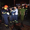 Rất đông lính cứu hộ đã được huy động để giải cứu các nạn nhân. (Ảnh: Sơn Bách/Vietnam+)