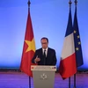Tổng thống Cộng hòa Pháp phát biểu tại Đại học Quốc gia Hà Nội. (Ảnh: Mính Sơn/Vietnam+)