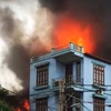 Vào khoảng gần 9 giờ sáng ngày 14/10, tại xưởng gỗ Khánh Hằng tại xã Hữu Bằng đã xảy ra một vụ hỏa hoạn nghiêm trọng. (Ảnh từ video)
