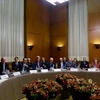 Các đại biểu tham giam cuộc đàm phán hạt nhân tại Palais des Nations ở thủ đô Geneva, Thụy Sĩ ngày 24/11. (Nguồn: THX/TTXVN)