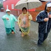 Cảnh ngập lụt tại Đài Loan sau khi bão Kong-Rey tràn qua. (Nguồn: AFP/TTXVN)