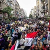 Tuần hành ủng hộ Tổng thống bị phế truất Mohamed Morsi tại Al-Matareya, ngoại ô Cairo. (Nguồn: THX/TTXVN)