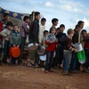 Khoảng 500.000 người Syria không nhận được cứu trợ lương thực do chiến tranh và lệnh cấm. (Nguồn: theguardian.com)