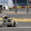 Robot PacBot có thể di chuyển với vận tốc 14 km/h trên mọi loại địa hình. (Nguồn: ubergizmo.com)