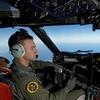 Máy bay của Không quân Hoàng gia Australia tham gia tìm kiếm hai vật thể nghi là mảnh vỡ từ chiếc máy bay mất tích tại Nam Ấn Độ Dương. (Nguồn: THX/TTXVN)