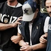 Cảnh sát Italy bắt giữ một trùm mafia hồi năm 2011. (Nguồn: AFP/TTXVN)