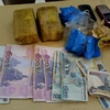 Tang vật thu giữ được trong một vụ vận chuyển mua bán ma túy qua biên giới Việt-Lào. (Nguồn: TTXVN)