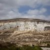 Công trình xây dựng khu định cư mới ở Givat Zeev, Khu Bờ tây, phía bắc Jerusalem. (Nguồn: AFP/TTXVN)