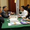 Các doanh nghiệp Việt Nam và Đài Loan thảo luận về khả năng hợp tác kinh doanh tại Chương trình giao lưu thương mại doanh nghiệp Việt Nam-Đài Loan năm 2013. (Ảnh: Hoàng Hải/Vietnam+)