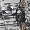 Hà Nội cắt bỏ hơn 10.000m dây, cáp treo trên cột điện