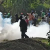 Biểu tình bạo động phản đối Tổng thống ở thủ đô Bujumbura ngày 2/6. (Nguồn: AFP/TTXVN)
