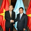 Phó Thủ tướng, Bộ trưởng Bộ Ngoại giao Phạm Bình Minh đón Tổng Thư ký Liên hợp quốc Ban Ki-moon trong chuyến thăm Việt Nam hồi tháng Năm. (Ảnh: Phạm Kiên/TTXVN)