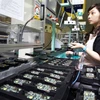 Công nhân làm việc trong một nhà máy của Samsung. (Nguồn: scmp.com)