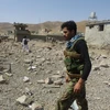 Binh sỹ Afghanistan điều tra tại hiện trường một vụ đánh bom ở Logar ngày 6/8. (Nguồn: THX/TTXVN)
