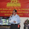 Đại sứ Việt Nam tại Singapore Nguyễn Tiến Minh điểm lại những thành tích của Đại sứ quán đã đạt được trong việc thúc đẩy quan hệ đối tác chiến lược Việt Nam-Singapore (Ảnh: Việt Hải, Mỹ Bình, Lê Hải/Vietnam+)