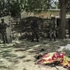 Lực lượng an ninh Cameroon gác tại hiện trường một vụ đánh bom. (Nguồn: AFP/TTXVN)
