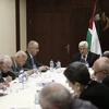 Tổng thống Palestine Mahmoud Abbas (giữa) chủ trì cuộc họp nội các tại thành phố Ramallah, Khu Bờ Tây. (Nguồn: THX/TTXVN)