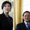 Cựu Thủ tướng Thái Lan Yingluck Shinawatra (trái) tại tòa án ở thủ đô Bangkok ngày 29/9. (Nguồn: Reuters/TTXVN)