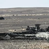 Mảnh vỡ máy bay A321 tại hiện trường sự cố ở Wadi al-Zolomat, Ai Cập ngày 1/11. (Nguồn: AFP/TTXVN)