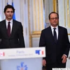 Thủ tướng Canada Justin Trudeau và Tổng thống Pháp Francois Hollande. (Nguồn: Getty Images)