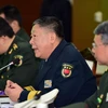 Vụ trưởng Vụ Đối ngoại thuộc Bộ Quốc phòng Trung Quốc, Chuẩn Đô đốc Quan Hữu Phi (ảnh, giữa) cho biết Trung Quốc kiên quyết phản đối chương trình phát triển vũ khí hạt nhân cũng như các vụ thử hạt nhân của Triều Tiên. (Nguồn: AFP/TTXVN)
