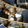 Bà Yulia Tymoshenko (giữa) dự một phiên họp ngày 16/2. (Nguồn: Reuters)