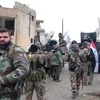 Binh sỹ Syria làm nhiệm vụ tại thị trấn Salma, Latakia ngày 12/1. (Nguồn: AFP/TTXVN)