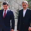 Thủ tướng Thổ Nhĩ Kỳ Ahmet Davutoglu (trái) và Phó Tổng thống thứ nhất Iran Eshaq Jahangiri. (Nguồn: ISNA)