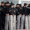 Cảnh sát chống bạo động Tunisia. (Nguồn: AFP/TTXVN)