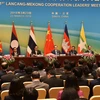 Phó Thủ tướng, Bộ trưởng Ngoại giao Phạm Bình Minh (ngoài cùng bên trái) dự họp báo chung và Lễ phát động Hợp tác Mekong​-Lan Thương. (Ảnh: Yến Kiên​/TTXVN)