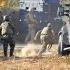 Lực lượng đặc nhiệm Tunisia làm nhiệm vụ tại khu vực thị trấn Ben Guerdane ngày 19/3. (Nguồn: AFP/TTXVN)