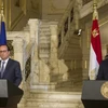 Tổng thống Ai Cập Abdel-Fattah al-Sisi (phải) và người đồng cấp Pháp Francois Hollande. (Nguồn: AFP)