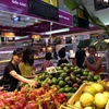 Người dân đến mua sắm tại siêu thị Big C Ninh Bình. (Ảnh: Anh Minh/TTXVN​)