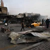 Hiện trường một vụ đánh bom đẫm máu ở Baghdad. (Nguồn: AFP/TTXVN)