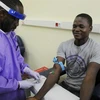 Một bệnh nhân nhiễm virus Ebola được chữa khỏi tại bệnh viện ở Monrovia, Liberia. (Nguồn: AFP/TTXVN)