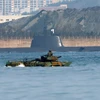Tàu ngầm và tàu đổ bộ của Hải quân Hàn Quốc tham gia tập trận tại vùng biển ngoài khơi thành phố miền đông Pohang ngày 7/3. (Nguồn: Yonhap/TTXVN)