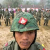 Một cuộc biểu dương lực lượng hồi năm 2006 của các tay súng thuộc Liên đoàn Quốc gia Karen, lực lượng đòi quyền tự trị rộng rãi hơn tại Myanmar. (Ảnh: EPA) 