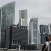 Các tòa nhà tại trung tâm tài chính của Singapore ngày 23/6. (Nguồn: EPA/TTXVN)
