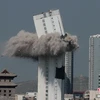 [Photo] Cận cảnh tòa nhà cao 90m bị đánh sập ở Trung Quốc