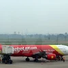 Tàu bay của VietJet Air đi từ sân bay quốc tế Nội Bài (Hà Nội). (Ảnh: Huy Hùng/TTXVN)