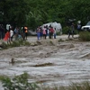 Một tuyến đường bị ngập lụt sau khi siêu bão Matthew quét qua Haiti. (Nguồn: EPA/TTXVN)