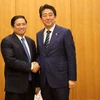 Ông Phạm Minh Chính, Ủy viên Bộ Chính trị, Bí thư Trung ương Đảng, Trưởng Ban Tổ chức Trung ương hội kiến với Thủ tướng Nhật Bản Shinzo Abe. (Ảnh: Thành Hữu/TTXVN)