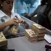 Venezuela: Nhiều đối tượng kích động bạo lực trong thời gian đổi tiền