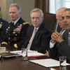 Tổng thống Mỹ Barack Obama (phải) chủ trì phiên họp nội các tại Washington, DC ngày 4/1. (Nguồn: AFP/TTXVN)